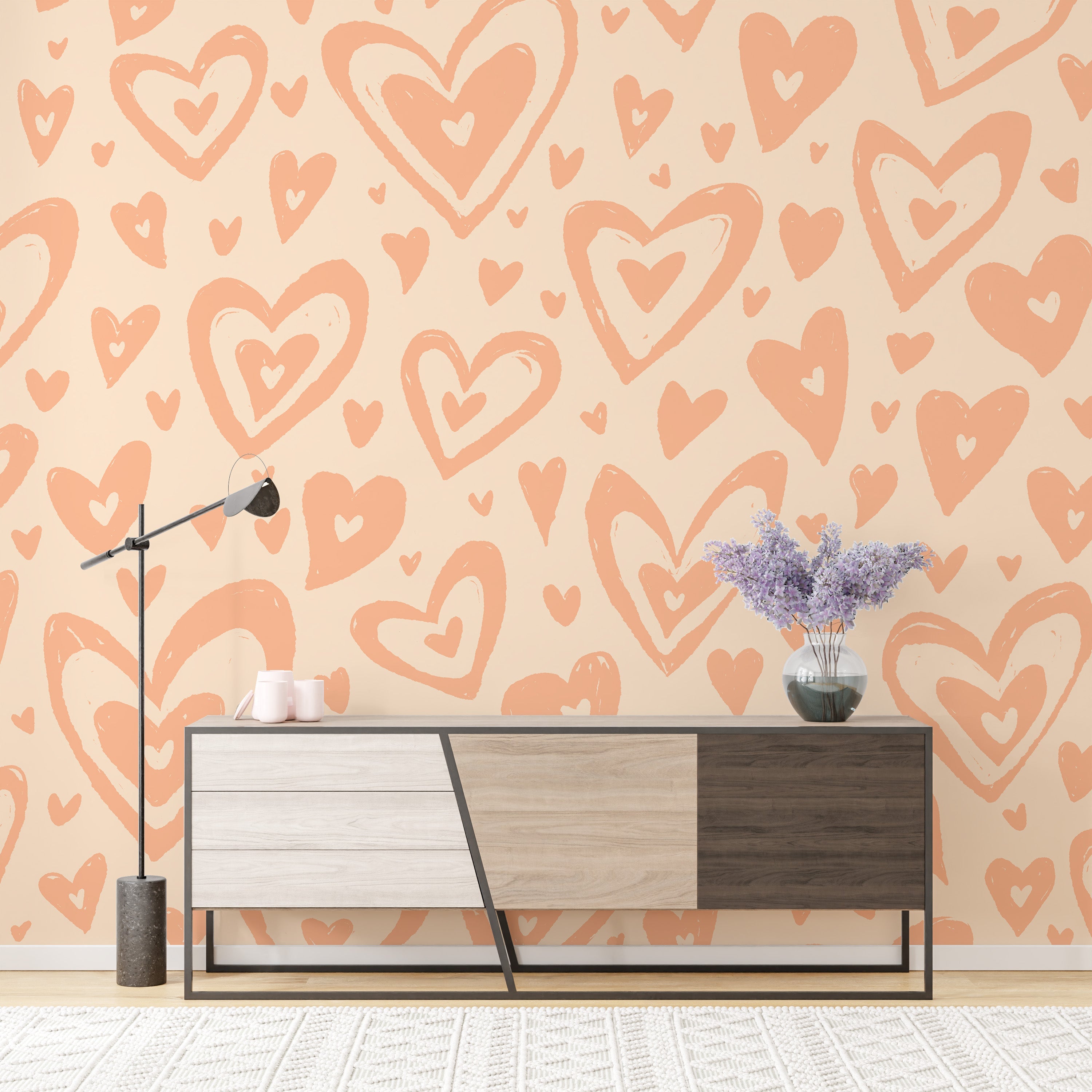 Soft peach fuzz hearts wallpaper mural for delicate wall styling.
