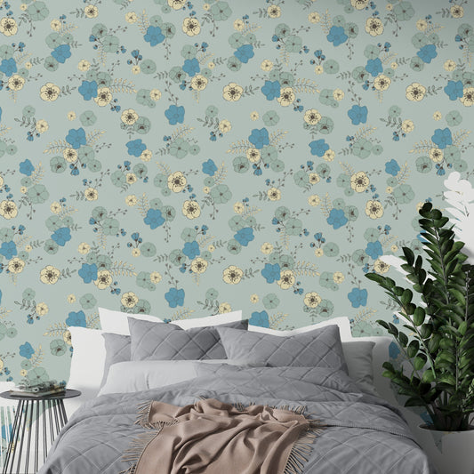 Charming ditsy blooms wallpaper in a soft pastel blue tone.
