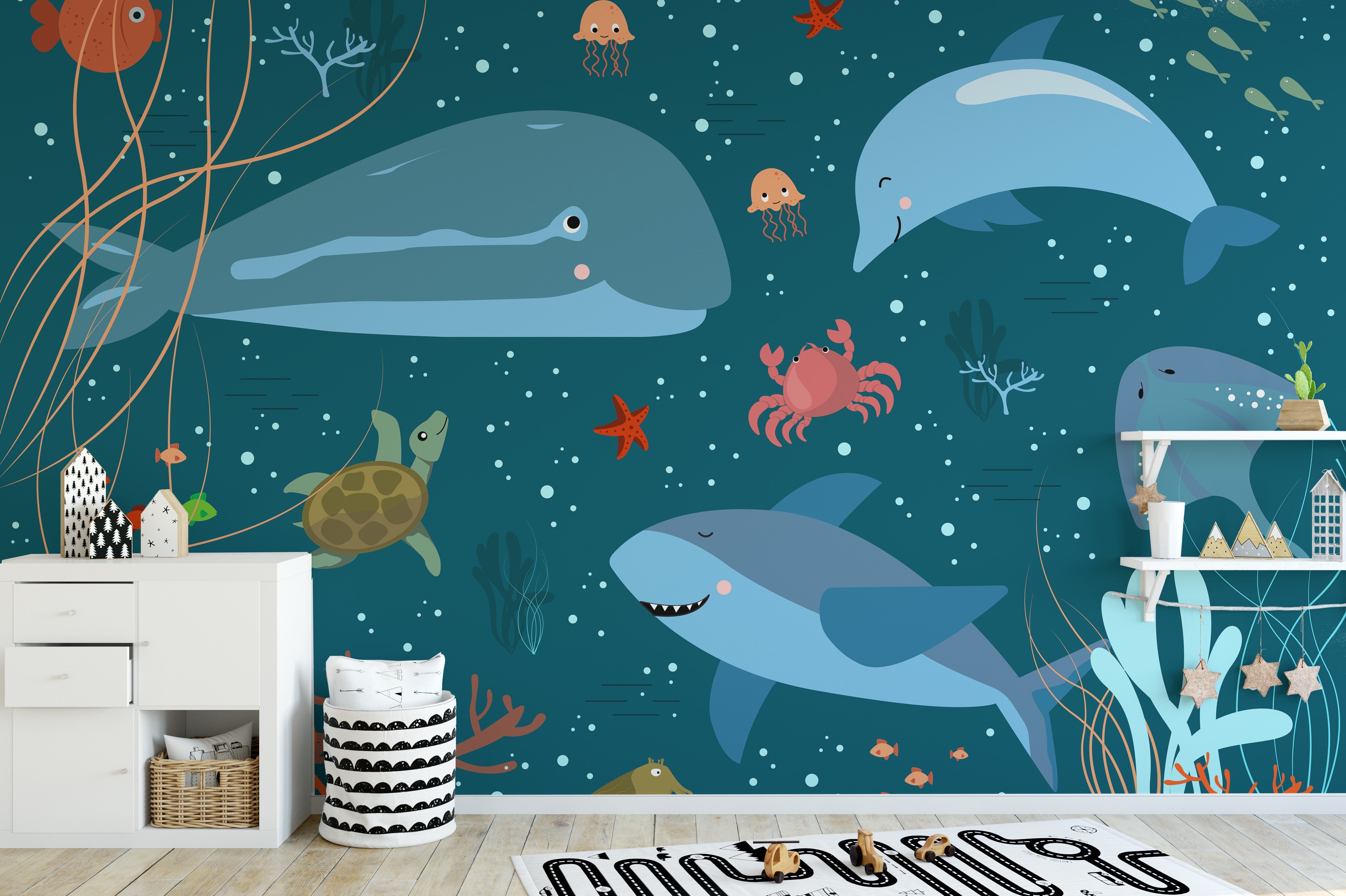 Blue underwater wallpaper with cartoon whales
