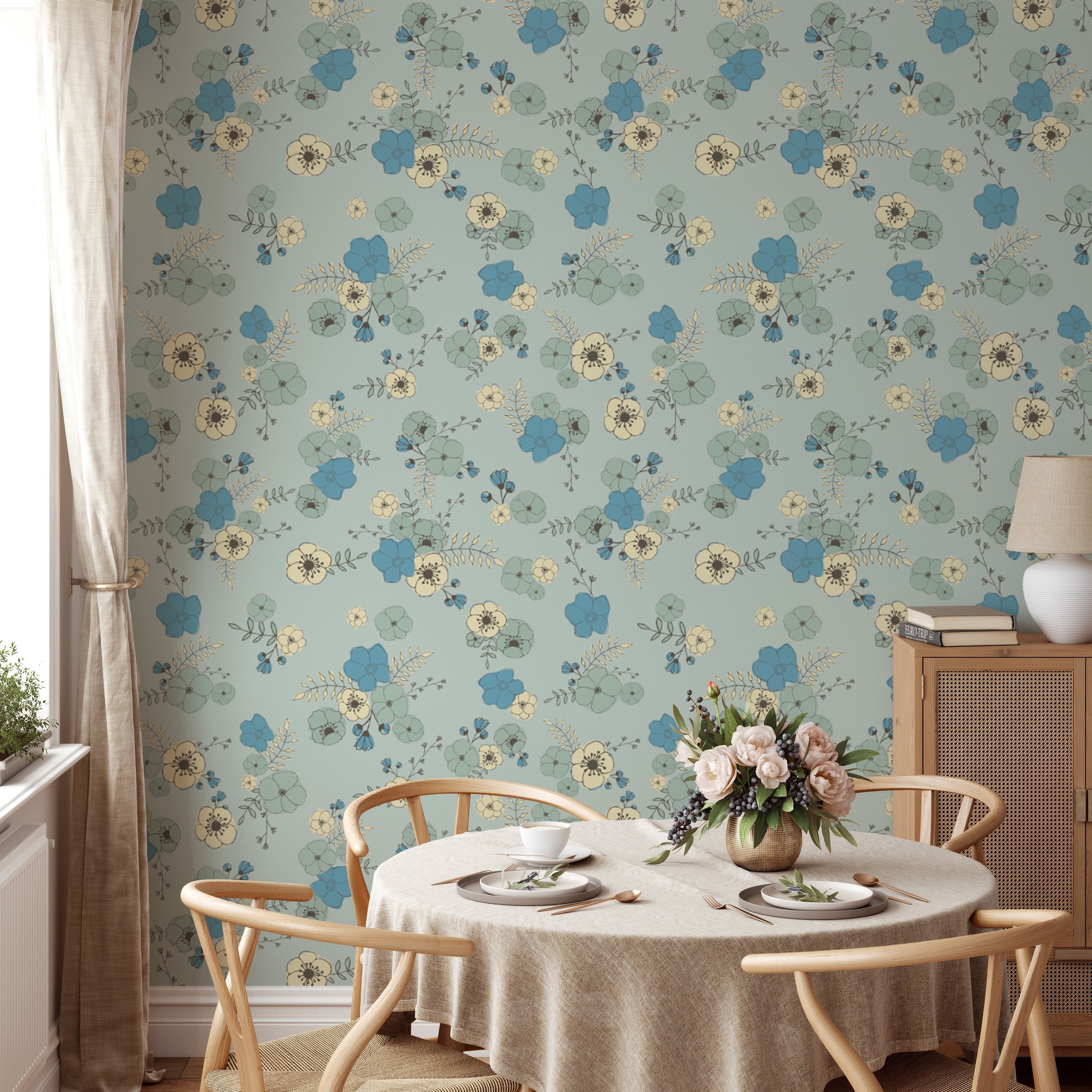 Artistic pastel blue wallpaper with dainty ditsy flower designs.
