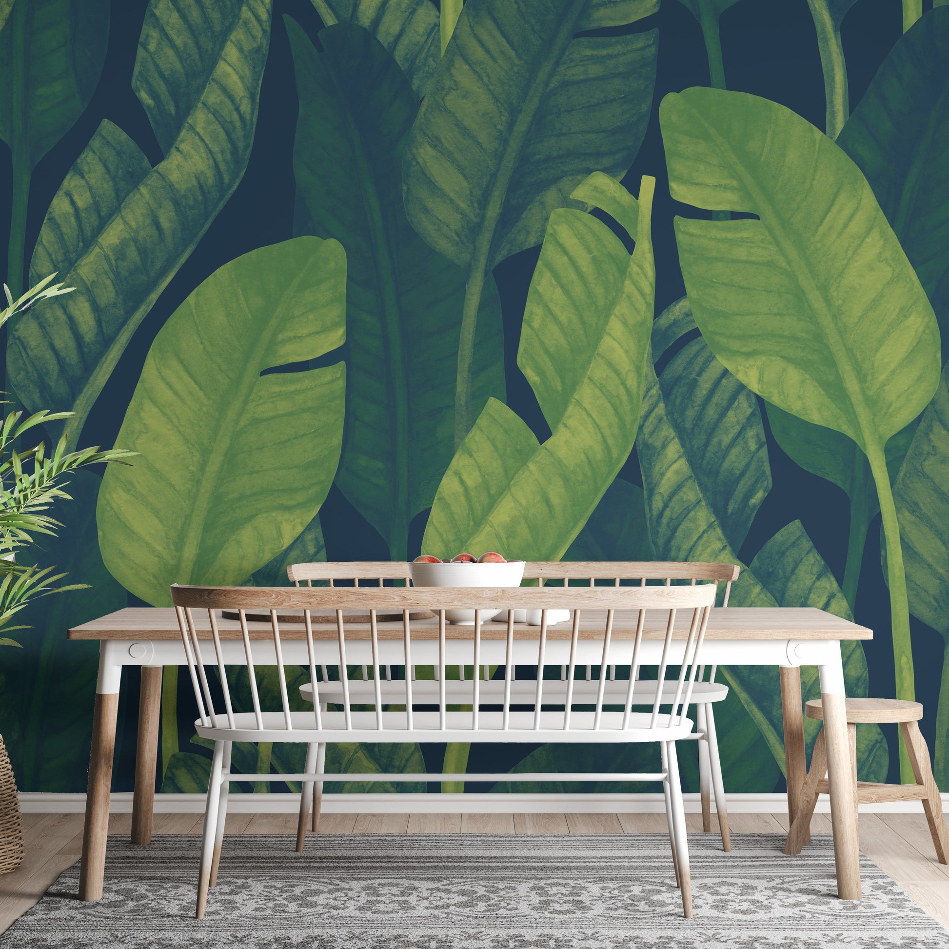 Oversized banana leaf mural in rich green shades
