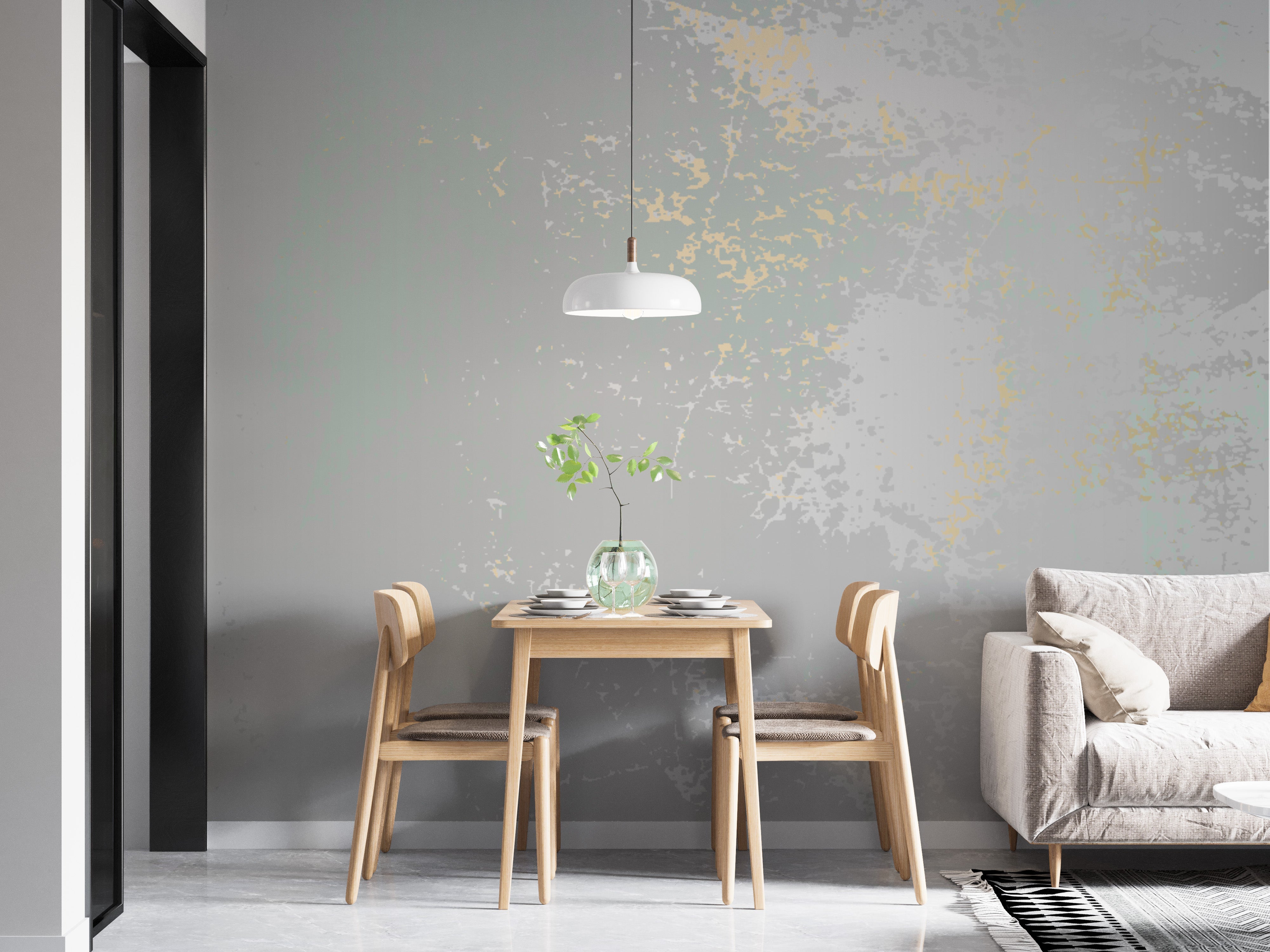 Pastel gray textured wallpaper with golden hues.