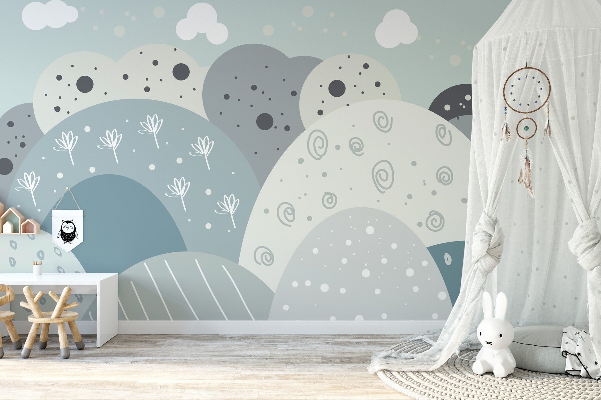 Whimsical mountain mural for kids' spaces